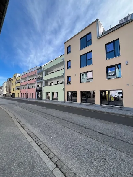 Exklusive Kapitalanlage: Vermietete 2-Zimmer-Erdgeschosswohnung mit Terrasse & Tiefgaragenstellplatz