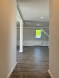 Blick aus dem Flur in den WOhnbereich