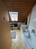 Dachgeschosswohnung - Badezimmer Ansicht 1