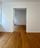 Blick aus dem Esszimmer ins Wohnzimmer