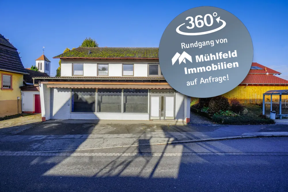 Einfamilienhaus mit Ladenfläche
