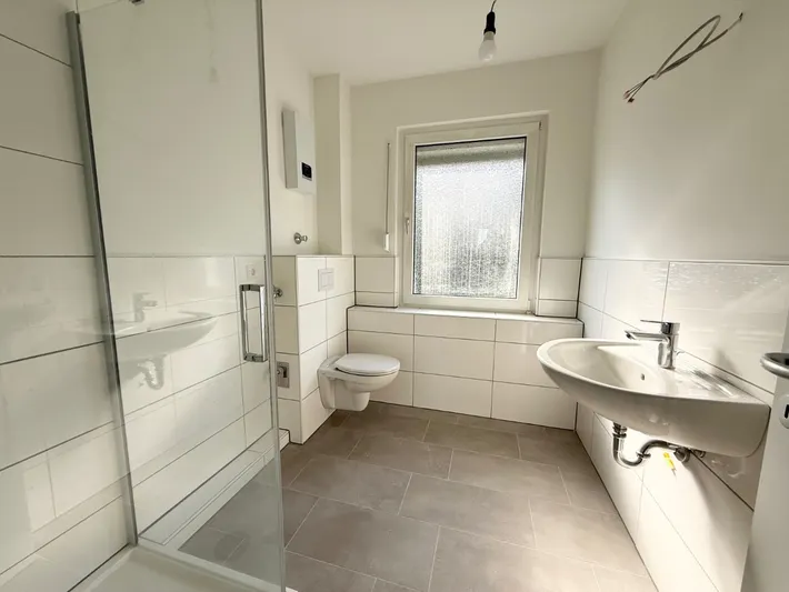 Renovierte 2-Zimmer-Erdgeschosswohnung mit Ausgang auf den eigenen Terrassenabschnitt zu vermieten! Wohnung zur Miete