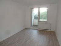 Wohnzimmer mit Balkon