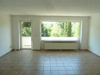 Wohnzimmer mit Balkon