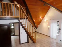 Wohnzimmer mit Blick zur Essecke und Küche