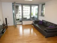 Wohnzimmer mit Balkon