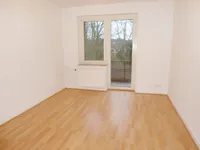 Wohnzimmer mit Balkon