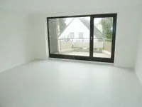 Wohnzimmer mit Balkon