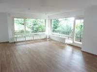 Wohn-Esszimmer mit Balkon