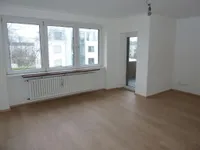 Wohnzimmer mit Balkon