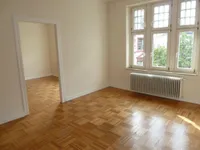 Esszimmer mit Blick ins Wohnzimmer