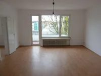 Wohnzimmer mit Balkon