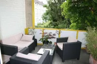 Überdachter Balkon