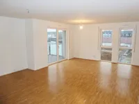 Wohnzimmer mit Balkon