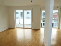 Wohnzimmer mit Balkon