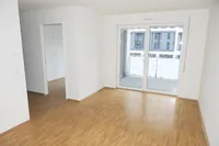 Wohnzimmer mit Balkon