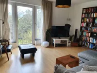 Wohnzimmer mit französischem Balkon