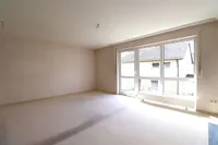 Wohnzimmer mit Balkon