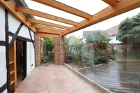 Kleiner Wintergarten an Terrasse