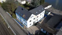 Bürogebäude mit Werkstatt auf ca. 2.200 m² großen Gewerbegrundstück am Rhein PROVISIONSFREI zu verk.