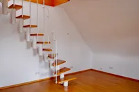 Treppe in den oberen Dachraum