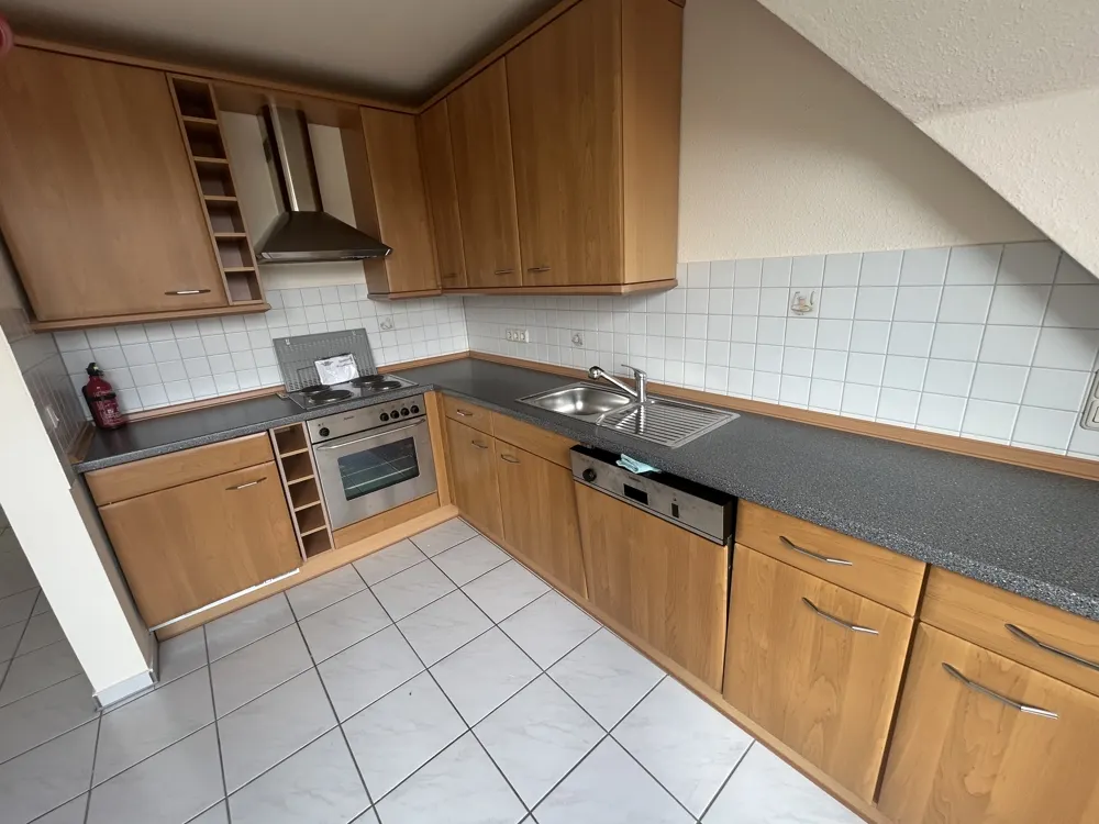 Wohnung zur Miete in Billerbeck Gemütliche Dachgeschosswohnung mit Balkon und Einbauküche Wohnen in bester Innenstadtlage von Billerbeck - Photo 1