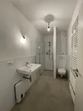 Bad mit bodentiefer Dusche