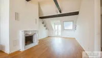 Wohnzimmer mit Kamin 