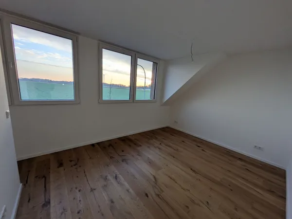 Schlafzimmer mit Seeblick