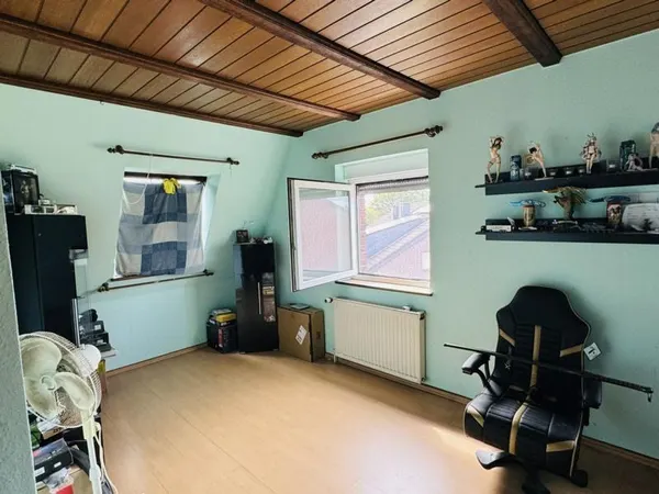 Wohnzimmer Dachgeschoss.JPG