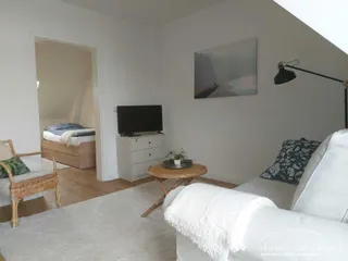 Moderne Wohnung im DG mit Balkon
