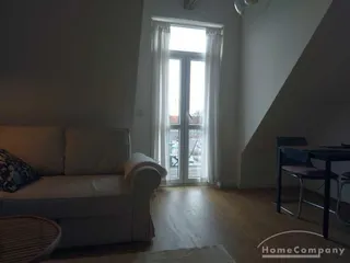 Moderne Wohnung im DG mit Balkon