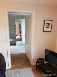 Moderne Wohnung im EG auf dem Hof eines Mehrfamilienhauses