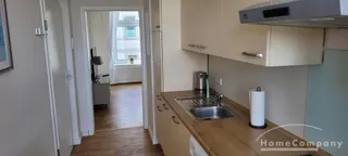 Moderne Wohnung im 1. OG mit Balkon