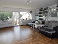 Wohnzimmer mit Balkon ELW