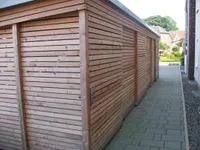 Fahrrad und Müll Schuppen