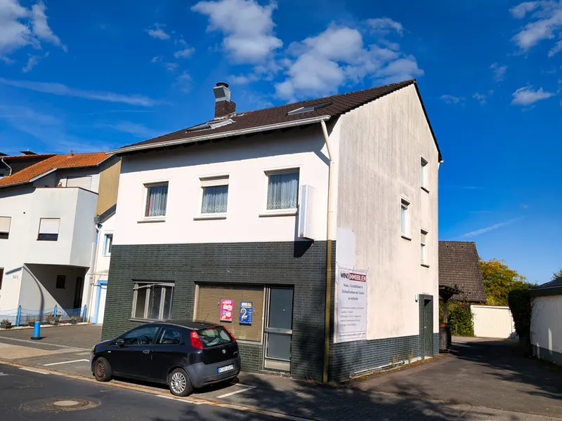 Wohn-/ Geschäftshaus