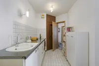 Küche mit Abstellraum