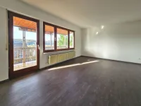 Wohnzimmer  mit Zugang Balkon und tollem Fernblick