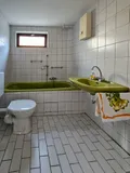 Badezimmer in der unteren Wohnung