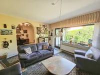 Wohnzimmer mit Zugang auf die Terrasse 
