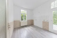 Wohnung 1: Küche mit Balkonzugang