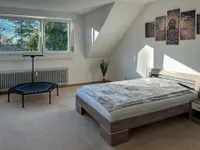 Schlafzimmer mit Blick ins Grüne