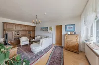 Wohnzimmer mit Eingang zur Loggia