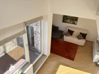 Wohnzimmer mit Balkon