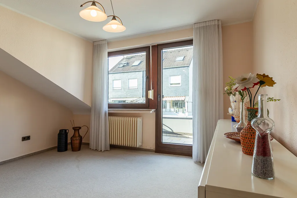 Schlafzimmer mit Balkon