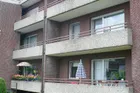 Wohnung und Balkon Mitte rechts