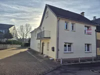 Vorne wohnen, hinten bauen