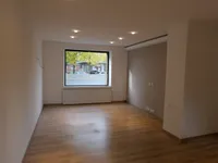 Moderne 2-Zimmer-Wohnung mit Terrasse und Garten