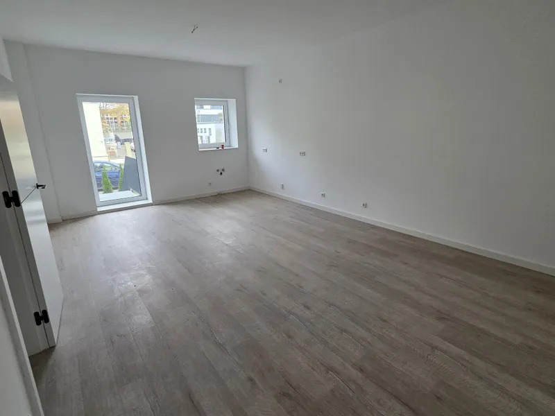 Beispielwohnraum mit offener Küche